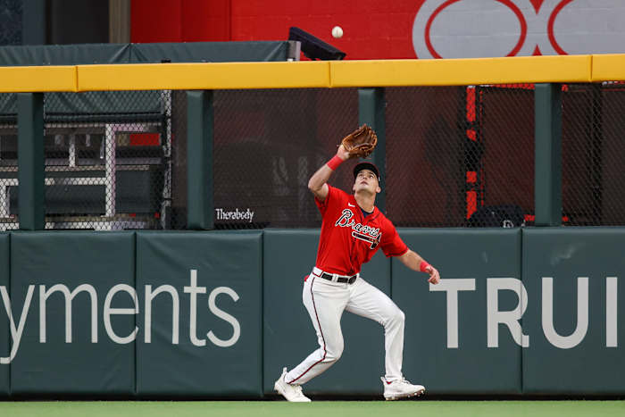 Apr 7, 2023; Atlanta, Georgia, USA; Atlanta Braves center fielder Sam Hilliard (14) catches a fly ball against the San Diego Padres in the third inning at Truist Park. Mandatory Credit: Brett Davis-USA TODAY Sports